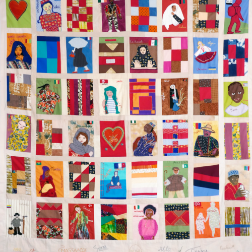 Œuvre d'art textile collective réalisée par des demandeurs d'asile et des bénévoles du Collectif